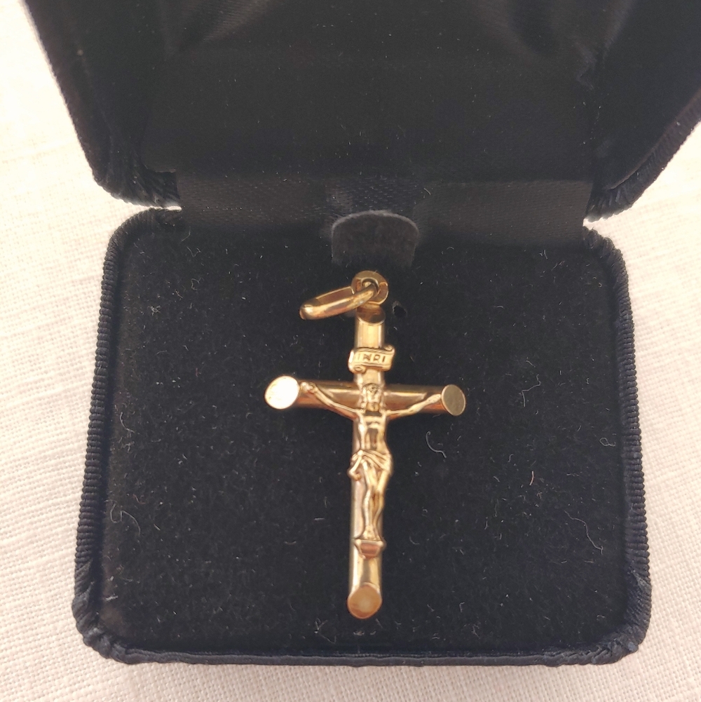 N/A. Gold Crucifix Pendant